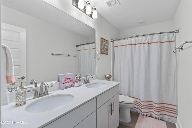 57 N Passerine Path, Hampstead, NC 28443 - bathroom with double vanity and curtained shower