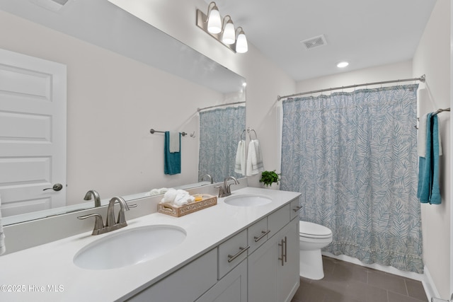 57 N Passerine Path, Hampstead, NC 28443 - bathroom featuring double vanity and tile patterned flooring