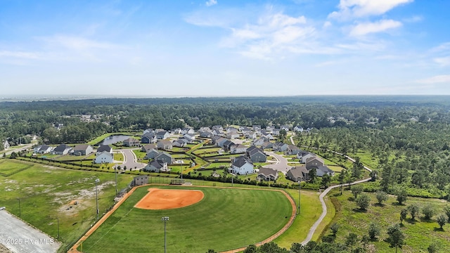 57 N Passerine Path, Hampstead, NC 28443 - aerial perspective of suburban area featuring a heavily wooded area