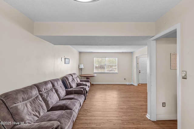 213 Spruce Ct, Jacksonville, NC 28546 - living area featuring wood finished floors and baseboards