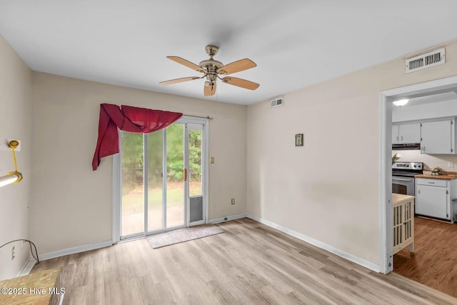 213 Spruce Ct, Jacksonville, NC 28546 - empty room featuring a ceiling fan, light wood-style flooring, and baseboards