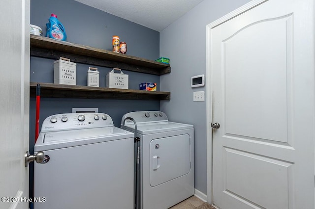 laundry area featuring laundry area and washer and dryer