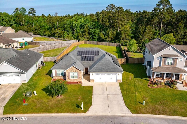 aerial view featuring a view of trees