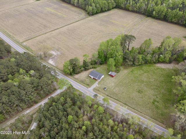 birds eye view of property featuring a rural view