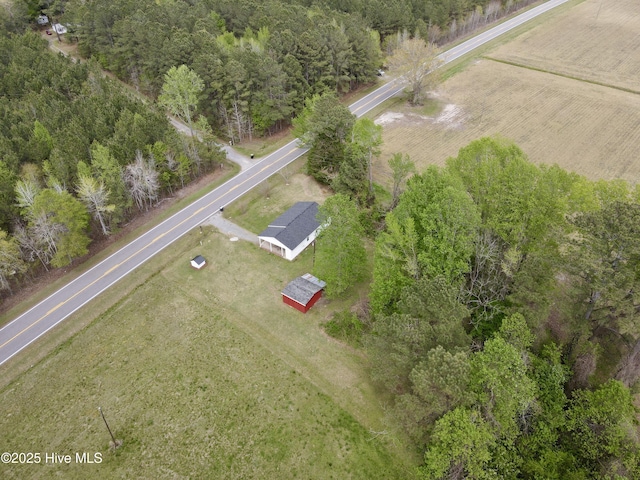 birds eye view of property featuring a rural view