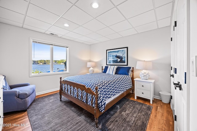 120 Clay Cir W, End, NC 27376 - bedroom featuring wood finished floors, baseboards, recessed lighting, and a drop ceiling