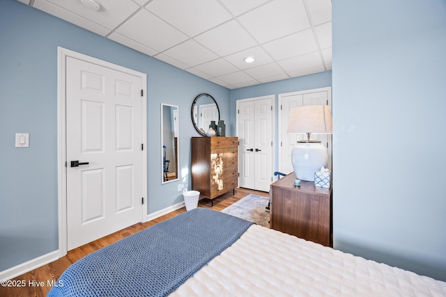 120 Clay Cir W, End, NC 27376 - bedroom with baseboards, a paneled ceiling, wood finished floors, and recessed lighting