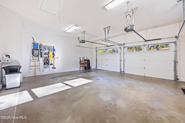 120 Clay Cir W, End, NC 27376 - garage featuring baseboards and a garage door opener
