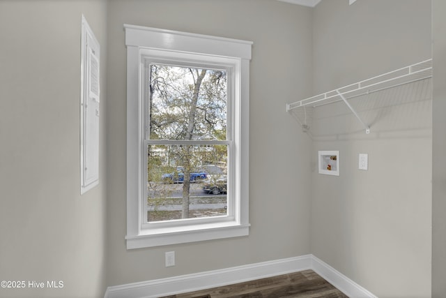 101 SE 68th St, Oak Island, NC 28465 - laundry area featuring dark wood-type flooring, baseboards, laundry area, and hookup for a washing machine