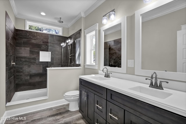 101 SE 68th St, Oak Island, NC 28465 - full bathroom featuring walk in shower, double vanity, a sink, and ornamental molding