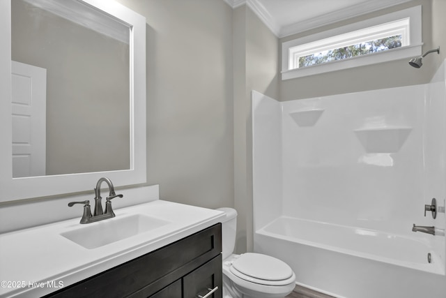 101 SE 68th St, Oak Island, NC 28465 - bathroom featuring ornamental molding, toilet, vanity, and shower / bathtub combination