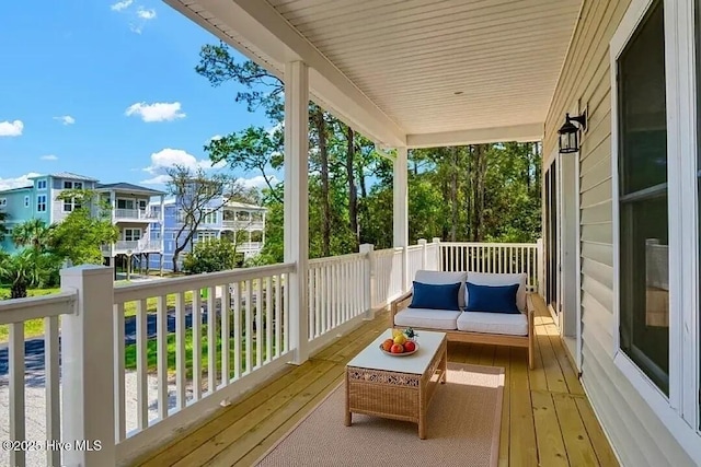 101 SE 68th St, Oak Island, NC 28465 - balcony with an outdoor living space