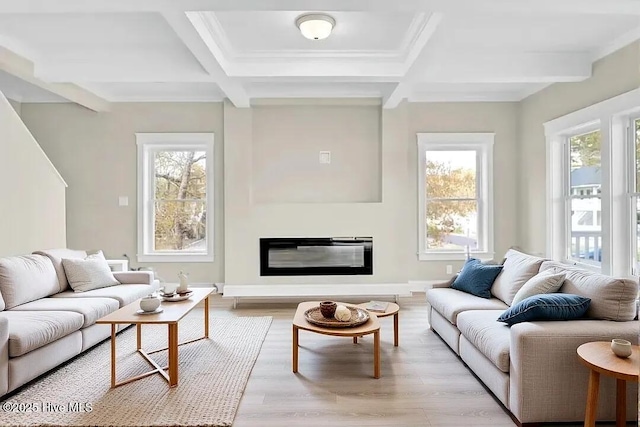 101 SE 68th St, Oak Island, NC 28465 - living area with beam ceiling, coffered ceiling, and a healthy amount of sunlight