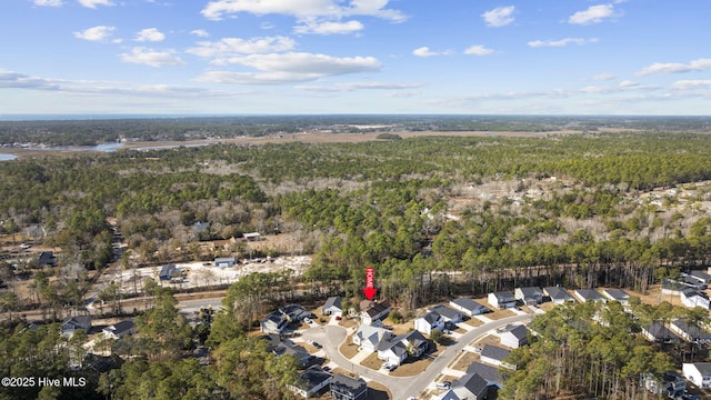 bird's eye view with a residential view and a wooded view