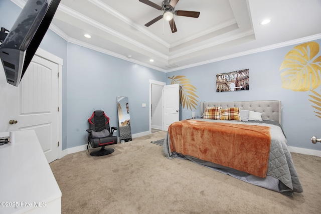 bedroom with crown molding, carpet, recessed lighting, baseboards, and a tray ceiling