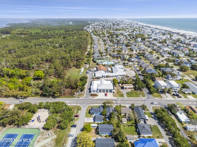birds eye view of property with a water view and a residential view