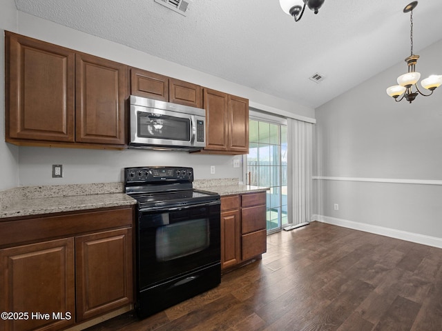 kitchen with a notable chandelier, stainless steel microwave, black / electric stove, lofted ceiling, and dark wood-style floors