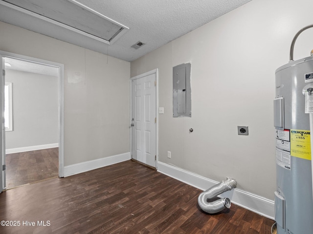 clothes washing area featuring laundry area, attic access, electric panel, water heater, and hookup for an electric dryer