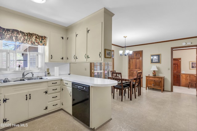kitchen featuring a notable chandelier, dishwasher, a sink, light countertops, and a peninsula