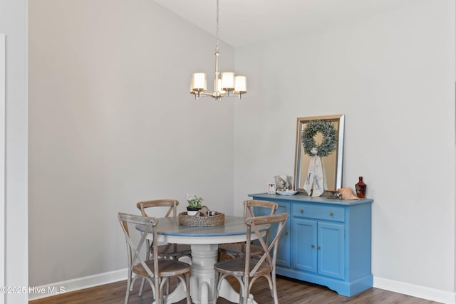 5006 Carleton Dr Unit 90, Wilmington, NC 28403 - dining area featuring wood finished floors, a chandelier, baseboards, and lofted ceiling