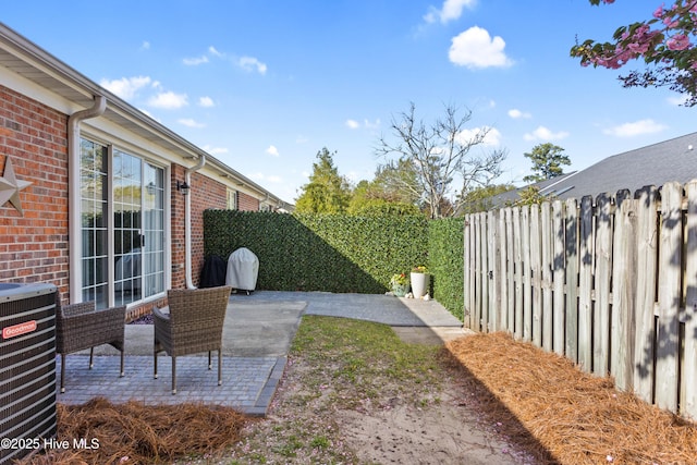 5006 Carleton Dr Unit 90, Wilmington, NC 28403 - fenced backyard with a patio area and central air condition unit