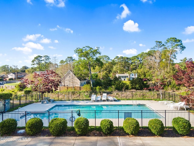 5006 Carleton Dr Unit 90, Wilmington, NC 28403 - community pool featuring view of scattered trees and a patio