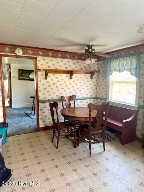 1885 NC-306, Grantsboro, NC 28529 - dining room featuring wallpapered walls and ceiling fan