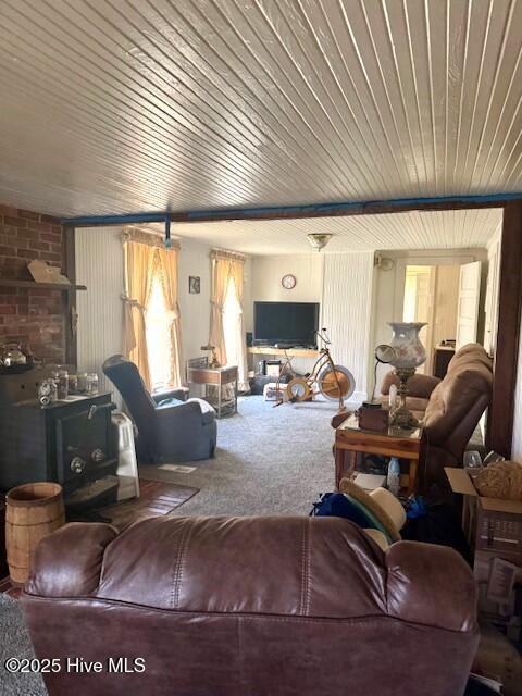 1885 NC-306, Grantsboro, NC 28529 - carpeted living area with wood ceiling