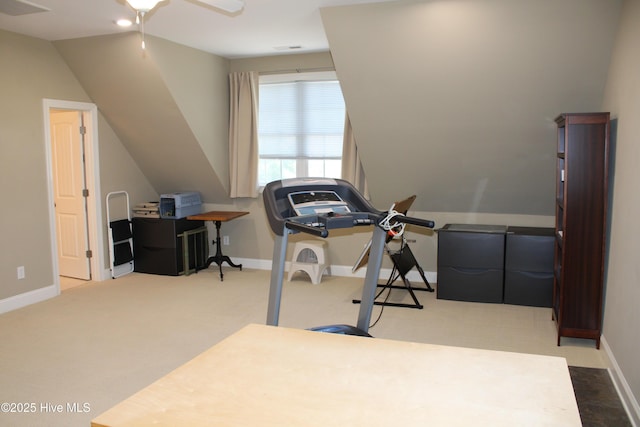 exercise area featuring ceiling fan, carpet floors, and baseboards