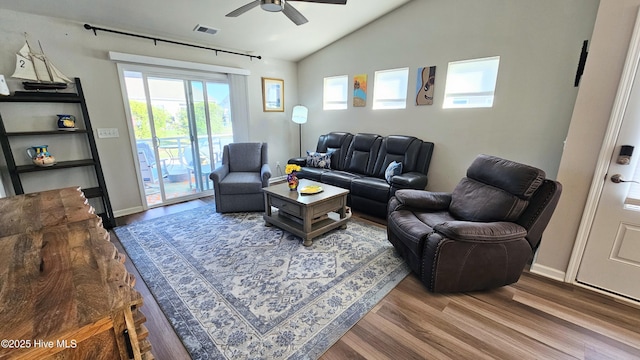 1905 Coleman Lake Dr, Calabash, NC 28467 - living room featuring wood finished floors, a ceiling fan, vaulted ceiling, and baseboards