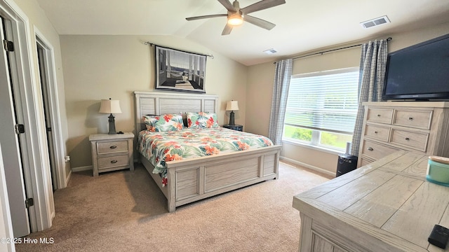 1905 Coleman Lake Dr, Calabash, NC 28467 - bedroom with baseboards, light carpet, lofted ceiling, and a ceiling fan