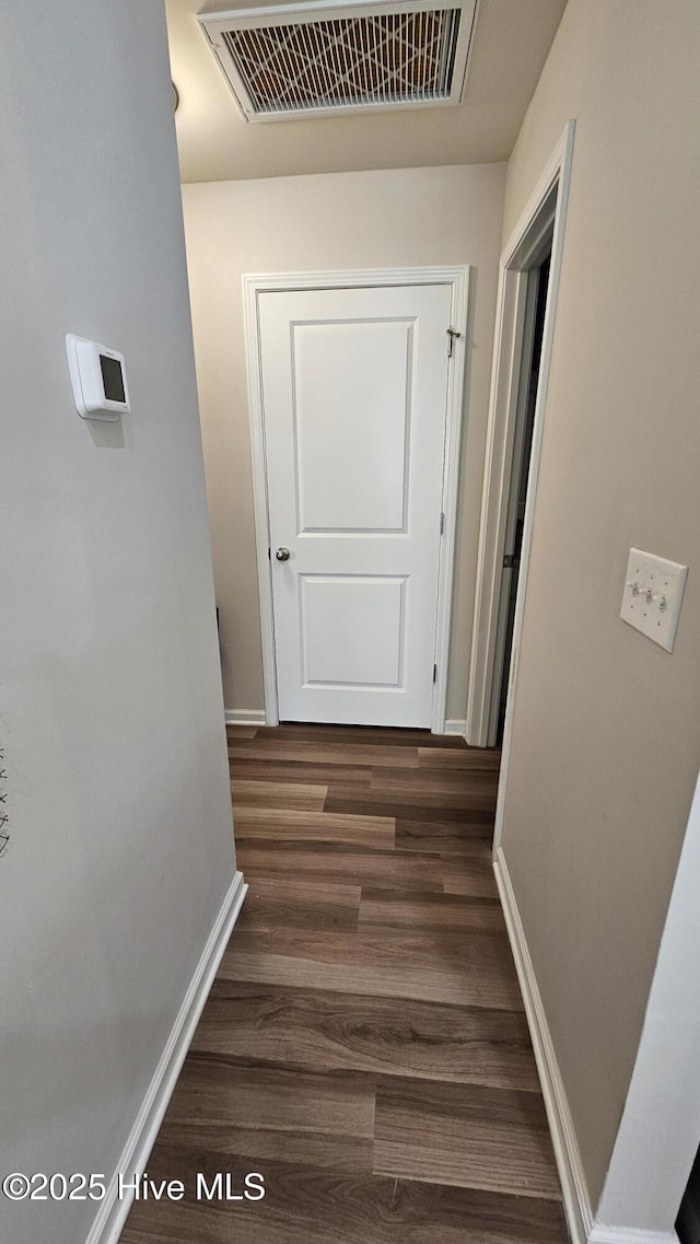 1905 Coleman Lake Dr, Calabash, NC 28467 - hallway featuring baseboards and dark wood-style floors