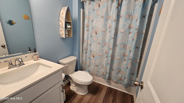 1905 Coleman Lake Dr, Calabash, NC 28467 - bathroom with wood finished floors, vanity, toilet, and shower / tub combo