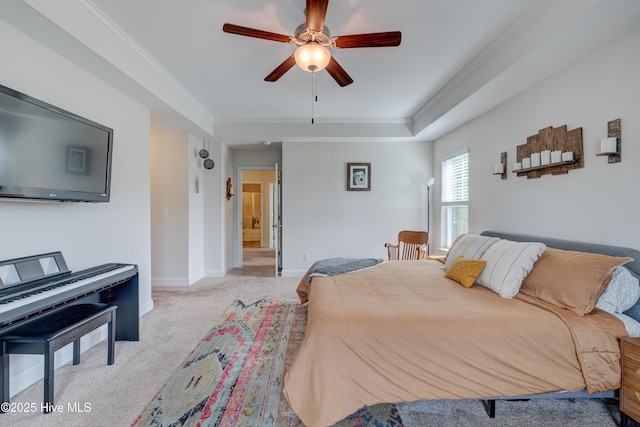 8603 Lanvale Forest Dr, Leland, NC 28451 - bedroom with a tray ceiling, light carpet, baseboards, ceiling fan, and crown molding