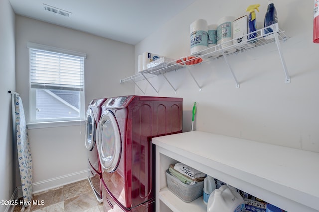 8603 Lanvale Forest Dr, Leland, NC 28451 - laundry room with washer and clothes dryer and baseboards