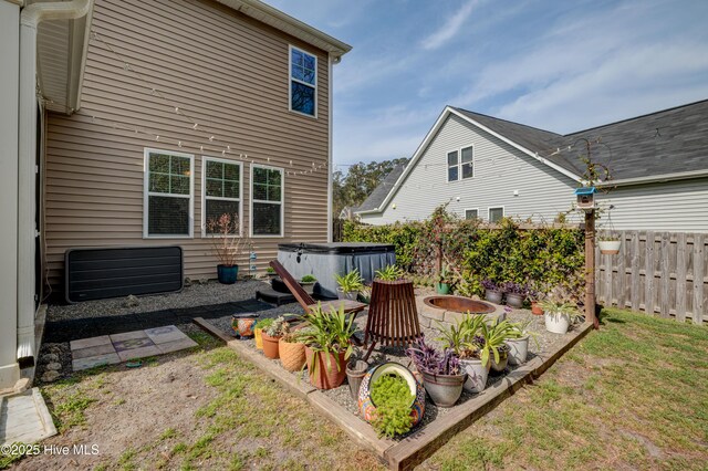 8603 Lanvale Forest Dr, Leland, NC 28451 - view of yard with a hot tub