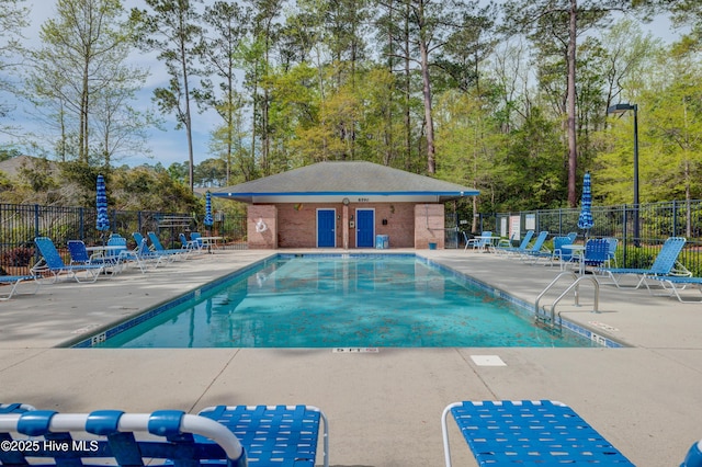 8603 Lanvale Forest Dr, Leland, NC 28451 - community pool with a patio area