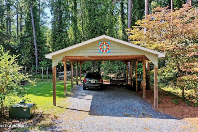 view of vehicle parking featuring a carport and gravel driveway
