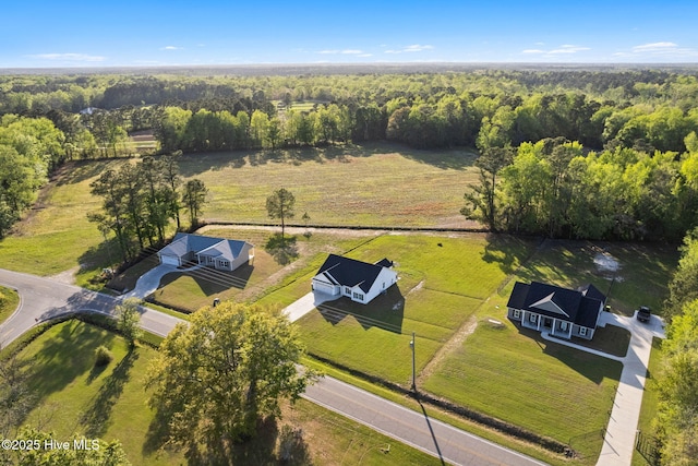 2665 Ash Little River Rd NW, Longwood, NC 28452 - overview of rural landscape with a forest