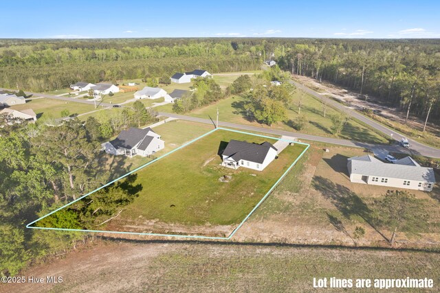 2665 Ash Little River Rd NW, Longwood, NC 28452 - aerial view of property's location featuring a heavily wooded area and property boundaries highlighted