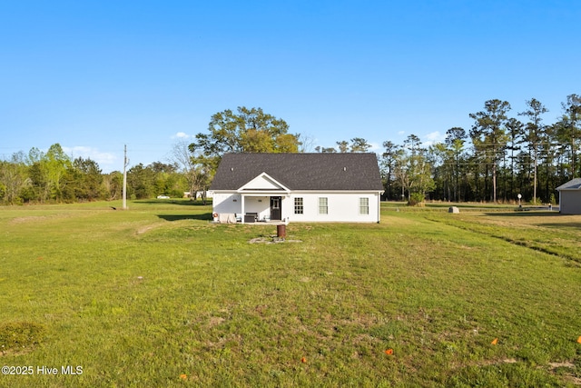 2665 Ash Little River Rd NW, Longwood, NC 28452 - view of front facade featuring a front yard