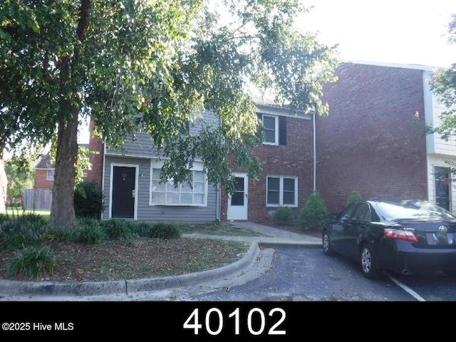 104 Chesterfield Ct Unit 20, Greenville, NC 27834 - view of front of house featuring brick siding
