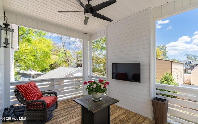 334 NE 48th St, Oak Island, NC 28465 - sunroom with ceiling fan