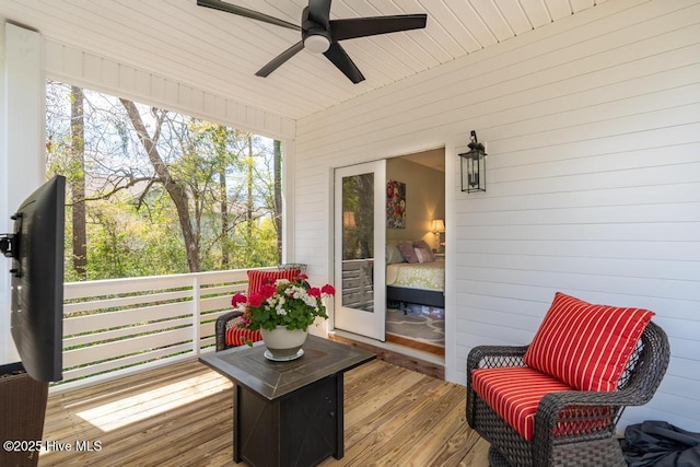 334 NE 48th St, Oak Island, NC 28465 - wooden deck with ceiling fan