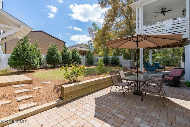 334 NE 48th St, Oak Island, NC 28465 - view of patio / terrace featuring a ceiling fan and outdoor dining space