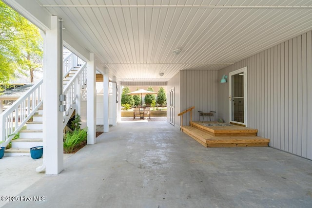 334 NE 48th St, Oak Island, NC 28465 - view of patio featuring stairs