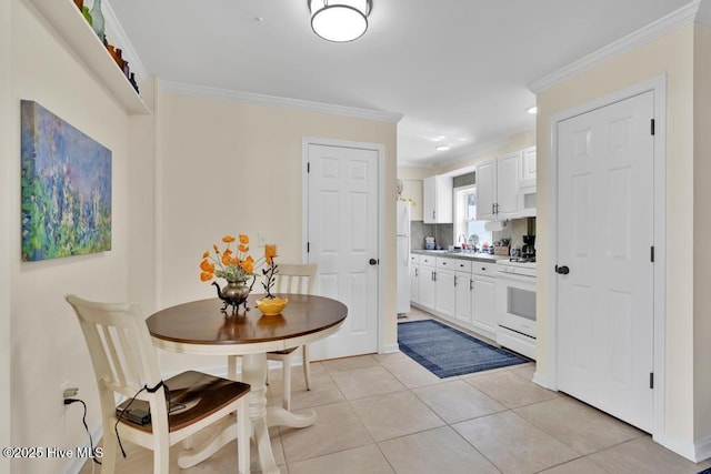334 NE 48th St, Oak Island, NC 28465 - dining room with crown molding, light tile patterned floors, and recessed lighting