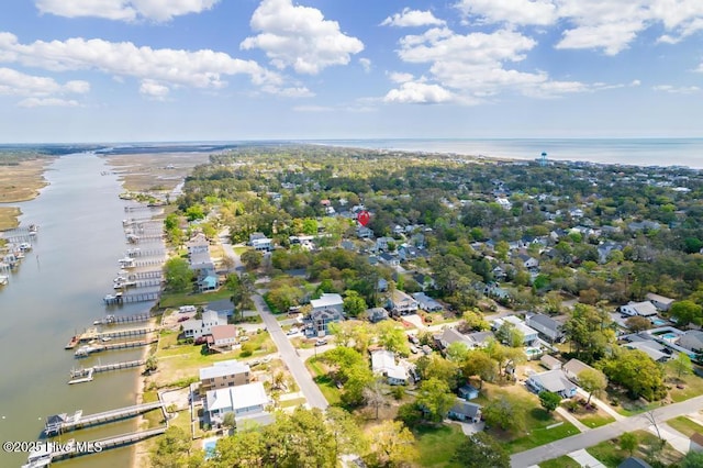 334 NE 48th St, Oak Island, NC 28465 - aerial overview of property's location featuring a nearby body of water