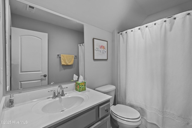 full bathroom featuring toilet and vanity