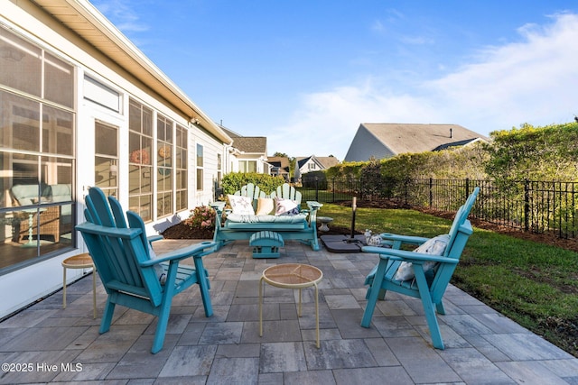 view of patio / terrace featuring an outdoor hangout area and fence